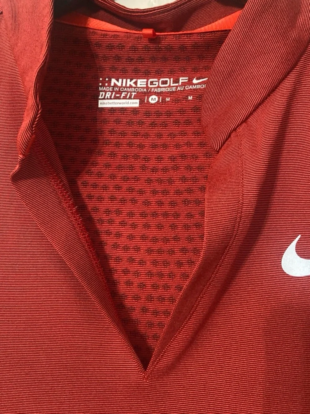 Nike Women’s Red Short Sleeve Golf Top with Swoosh